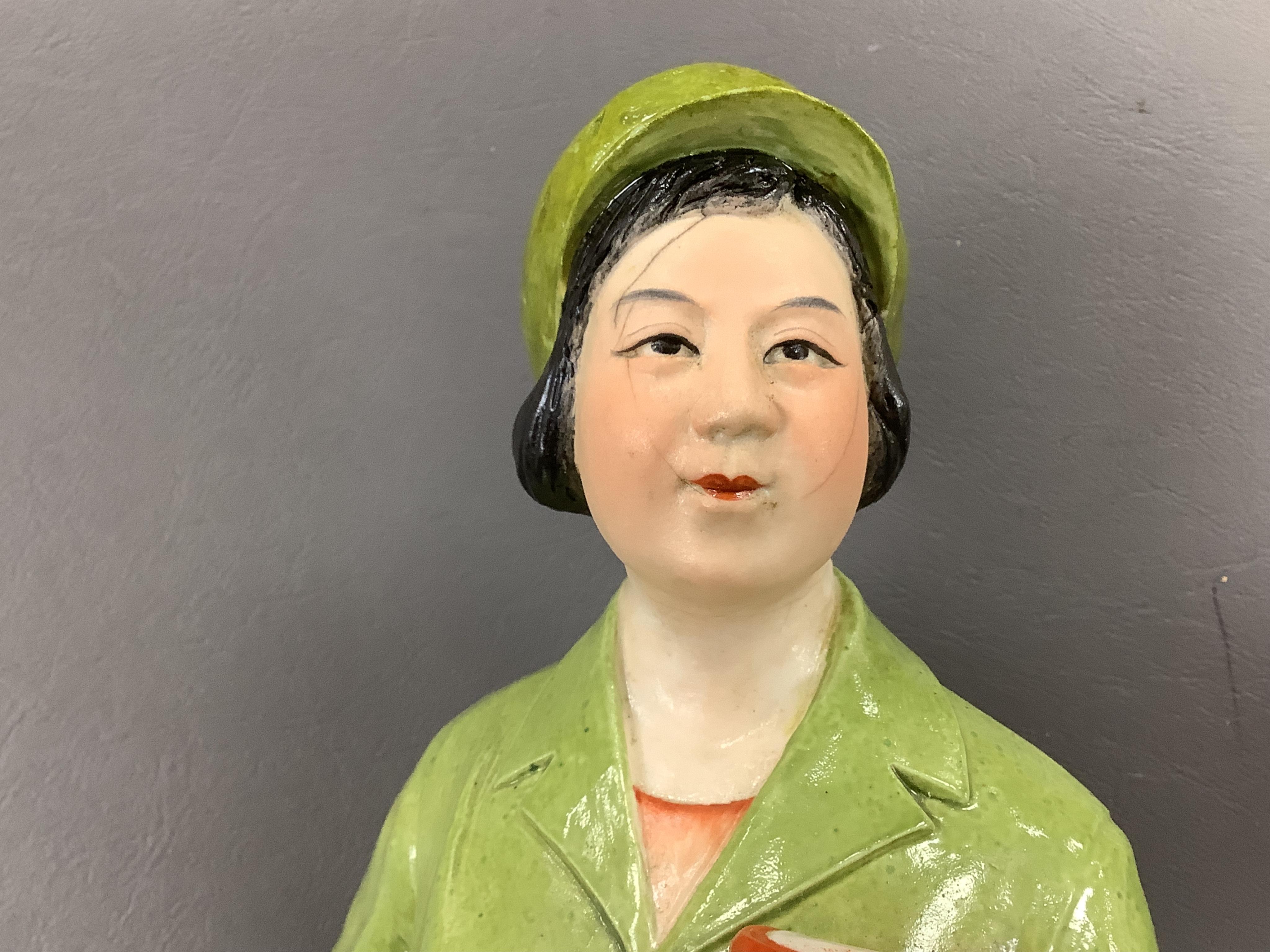 Two Chinese Cultural Revolution female figures, Tallest 42cm high. Condition - one figure face cracked, the other has wear to gilding.